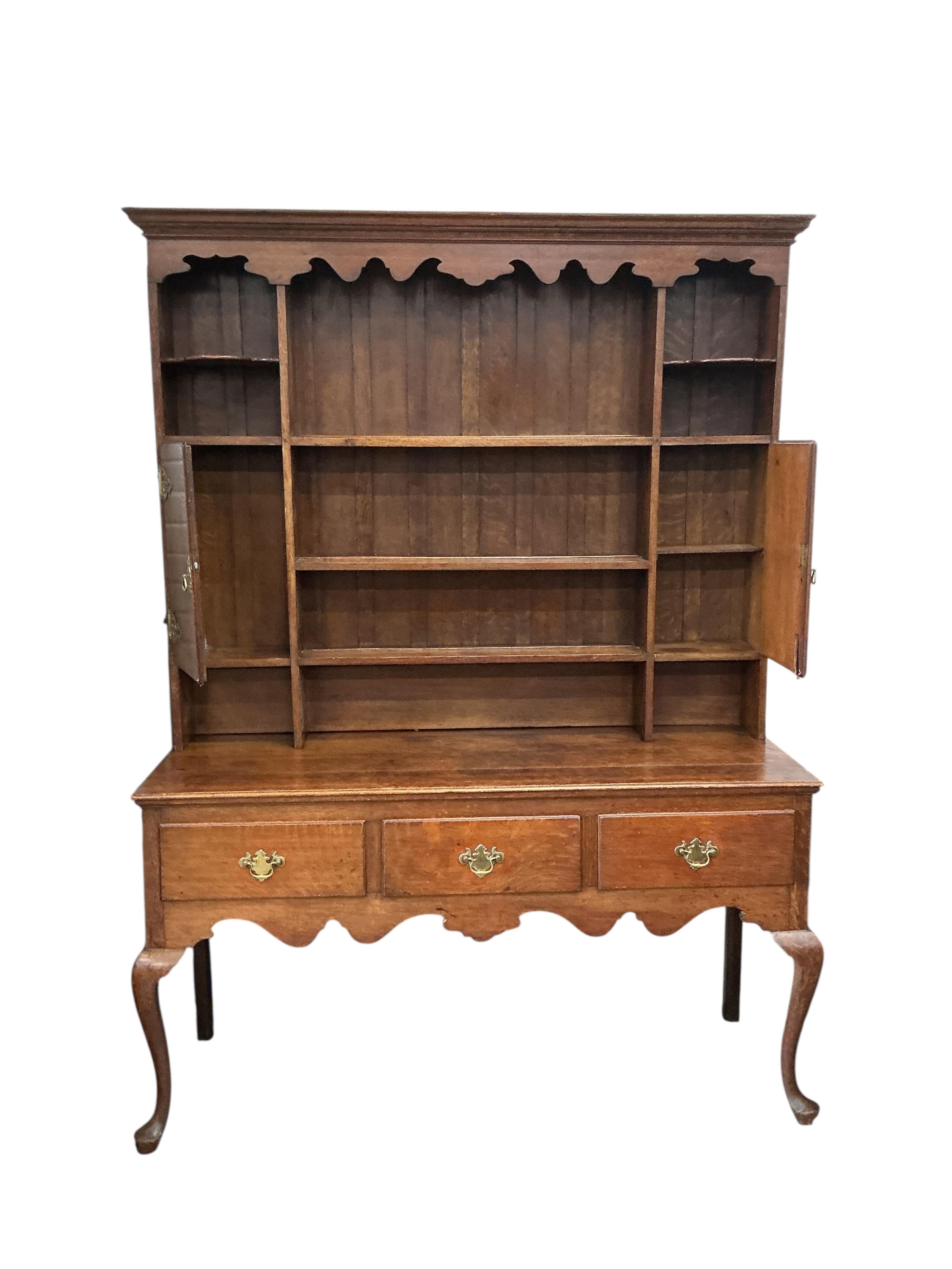 A late Victorian oak dresser, width 152cm, depth 52cm, height 210cm